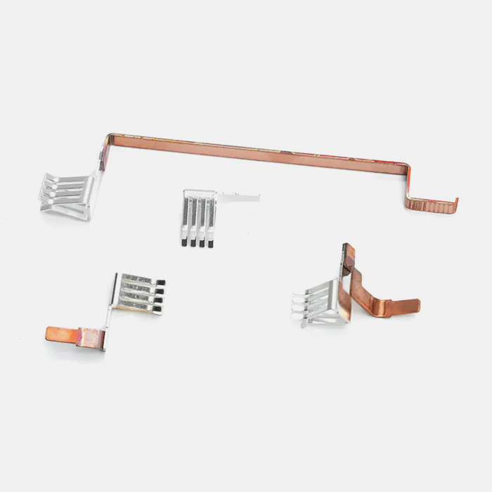 Kobberbaserte belagte stemplingsdeler